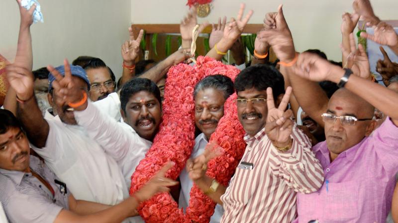 Tamil Nadu Chief Minister O Panneerselvam being greeted by his supporters at his residence in Chennai. (Photo: PTI) Tamil Nadu Chief Minister O Panneerselvam being greeted by his supporters at his residence in Chennai. (Photo: PTI)