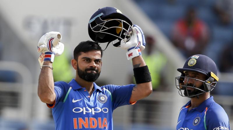 Virat Kohli together with Dinesh Karthik (50 not off 52 balls) stitched unbeaten 122 runs partnership to take the team home. (Photo:AP) Virat Kohli together with Dinesh Karthik (50 not off 52 balls) stitched unbeaten 122 runs partnership to take the team home. (Photo:AP)
