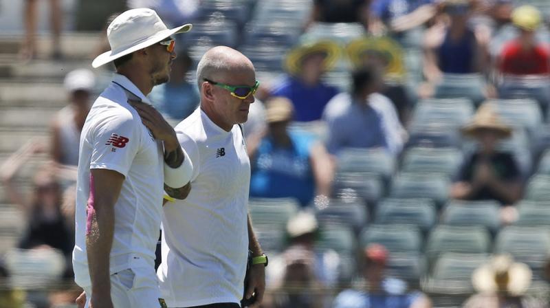 Dale Steyn went off the field and headed to the hospital for scans after he injured his shoulder during the second day’s play of first Australia-South Africa Test. (Photo: AP) Dale Steyn went off the field and headed to the hospital for scans after he injured his shoulder during the second day’s play of first Australia-South Africa Test. (Photo: AP)