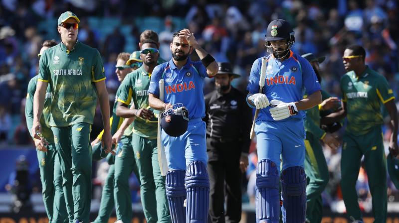 Virat Kohli and Yuvraj Singh make their way back to the dressing room after guiding their side to a victory against South Africa, at The Oval. (Photo: AP) Virat Kohli and Yuvraj Singh make their way back to the dressing room after guiding their side to a victory against South Africa, at The Oval. (Photo: AP)