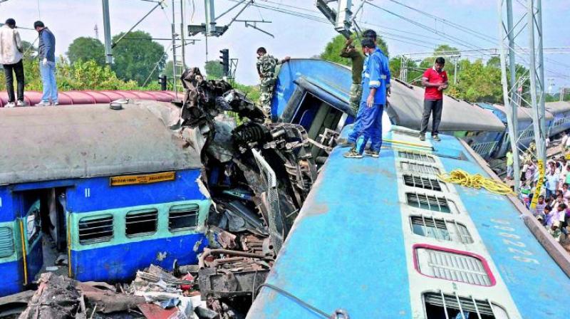 Rescue efforts at the site where the Hirakhand Express derailed. Officials say the toll could go up from the 40 dead, reported on Sunday. (Photo: PTI) Rescue efforts at the site where the Hirakhand Express derailed. Officials say the toll could go up from the 40 dead, reported on Sunday. (Photo: PTI)