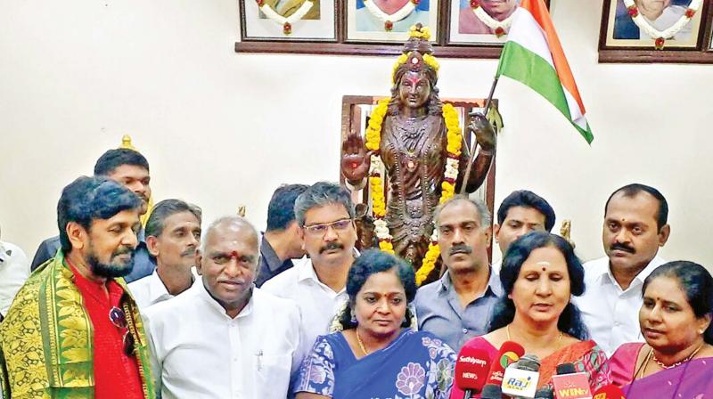Late AIADMK founder MGR’s kin joined the BJP on his birth centenary on Tuesday. State BJP president Dr S. Tamilisai Soundararajan and Union minister Pon Radhakrishnan are also seen. (Photo: DC) Late AIADMK founder MGR’s kin joined the BJP on his birth centenary on Tuesday. State BJP president Dr S. Tamilisai Soundararajan and Union minister Pon Radhakrishnan are also seen. (Photo: DC)