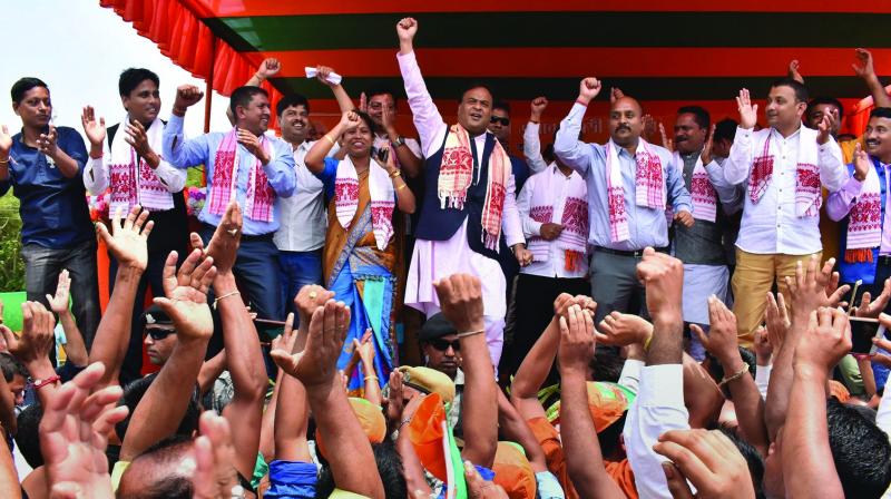 BJP leader Himanta Biswa Sarmah dances with the crowd during an election campaign rally at Bahjani in Nalbari district of Assam on Tuesday in support of the party candidate Dilip Saikia of Mangaldoi parliamentary constituency (Photo: AP) BJP leader Himanta Biswa Sarmah dances with the crowd during an election campaign rally at Bahjani in Nalbari district of Assam on Tuesday in support of the party candidate Dilip Saikia of Mangaldoi parliamentary constituency (Photo: AP)