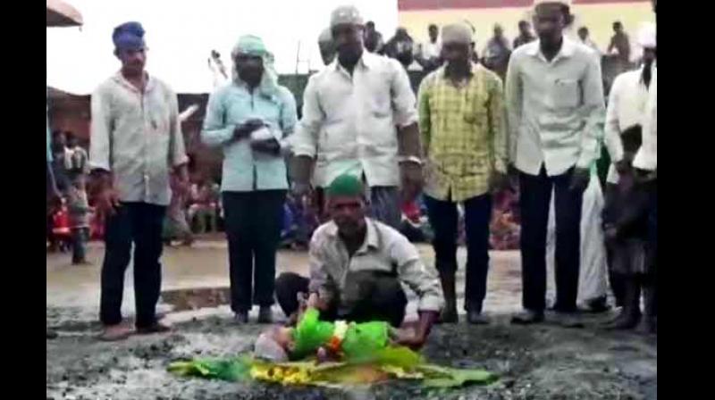 The act is reportedly part of a Muharram ritual and is performed after a wish sought for the child gets fulfilled. (Photo: ANI/Twitter) The act is reportedly part of a Muharram ritual and is performed after a wish sought for the child gets fulfilled. (Photo: ANI/Twitter)