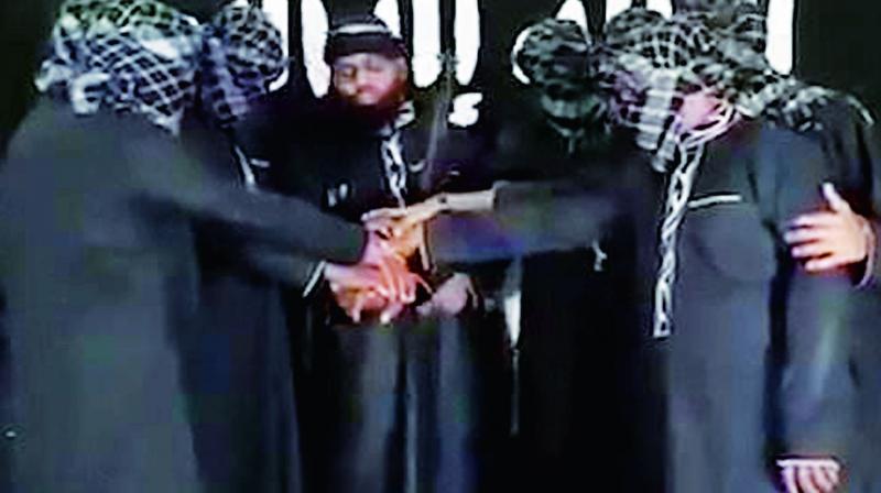 ISIS released this video of Zahran Hashim (face uncovered), the leader of the National Tawheed Jamath, leading the terrorists taking the oath of allegiance to Abu Bakr al Baghdadi, the Caliph of ISIS, before launching their Easter attacks in Sri Lanka. ISIS released this video of Zahran Hashim (face uncovered), the leader of the National Tawheed Jamath, leading the terrorists taking the oath of allegiance to Abu Bakr al Baghdadi, the Caliph of ISIS, before launching their Easter attacks in Sri Lanka.