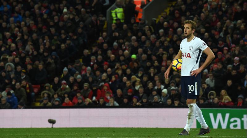Kane had the last word as his 100th Premier League goal from a controversial stoppage-time penalty handed Spurs a share of the spoils at Anfield. (Photo: AFP) Kane had the last word as his 100th Premier League goal from a controversial stoppage-time penalty handed Spurs a share of the spoils at Anfield. (Photo: AFP)
