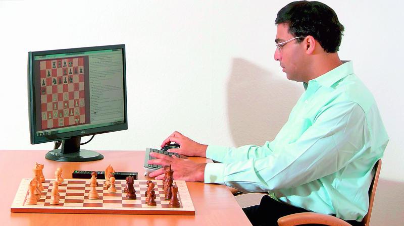 A file photo of Grandmaster Viswanathan Anand playing chess with a computer. A file photo of Grandmaster Viswanathan Anand playing chess with a computer.
