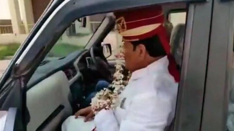 According to news agency ANI, Firoz Khan, party leader from Sambhal, wore a sehra or headdress and disguised himself as a groom to dodge the police. (Photo: ANI) According to news agency ANI, Firoz Khan, party leader from Sambhal, wore a sehra or headdress and disguised himself as a groom to dodge the police. (Photo: ANI)