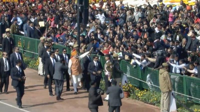 Prime Minister Narendra Modi greets crowds at Republic Day parade in Delhi (Photo: ANI | Twitter) Prime Minister Narendra Modi greets crowds at Republic Day parade in Delhi (Photo: ANI | Twitter)