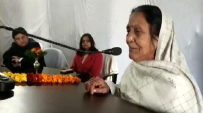 The woman, Rajeshwari Mishra, who has been for the last 40 years, apart of the annual flag hoisting event at the Shahjahapur district collectorate couldn’t control her emotions and wept during her address after the flag hosting ceremony. (Photo: ANI) The woman, Rajeshwari Mishra, who has been for the last 40 years, apart of the annual flag hoisting event at the Shahjahapur district collectorate couldn’t control her emotions and wept during her address after the flag hosting ceremony. (Photo: ANI)