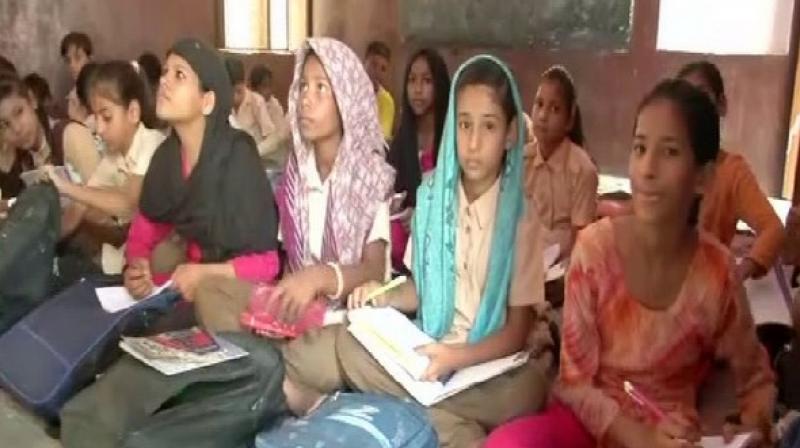 The school conducts classes for the students of Cass I to VIII and is run in two shifts where these students are taught lessons in Urdu and the Quran in the morning followed by Sanskrit 'shlokas' in the afternoon. (Photo: ANI) The school conducts classes for the students of Cass I to VIII and is run in two shifts where these students are taught lessons in Urdu and the Quran in the morning followed by Sanskrit 'shlokas' in the afternoon. (Photo: ANI)