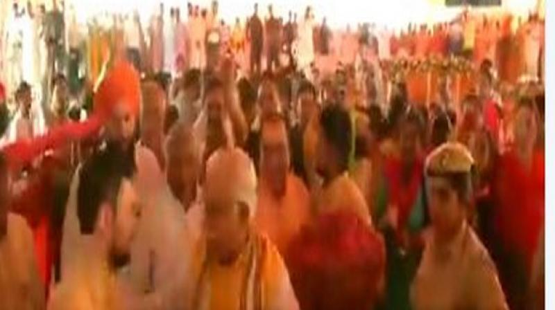 Video footage, which has surfaced on social media platforms, also shows that before taking a selfie, the youth touched Khattar's feet to seek his blessings. (Photo: Screengrab) Video footage, which has surfaced on social media platforms, also shows that before taking a selfie, the youth touched Khattar's feet to seek his blessings. (Photo: Screengrab)