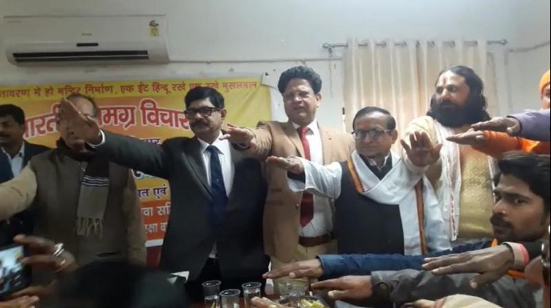 Surya Kumar Shukla, a 1982 batch officer of the UP cadre, allegedly raised his hand to pledge with others for the 'early construction of Ram temple in Ayodhya' on Jan 28. (Photo: Screengrab) Surya Kumar Shukla, a 1982 batch officer of the UP cadre, allegedly raised his hand to pledge with others for the 'early construction of Ram temple in Ayodhya' on Jan 28. (Photo: Screengrab)