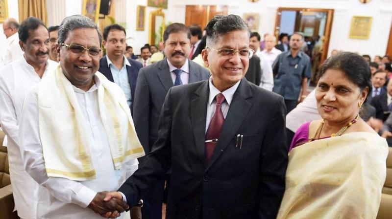 Karnataka Lokayukta Justice Vishwanath Shetty (centre) was stabbed in his Bengaluru office by a person on Wednesday. (Photo: PTI | File) Karnataka Lokayukta Justice Vishwanath Shetty (centre) was stabbed in his Bengaluru office by a person on Wednesday. (Photo: PTI | File)
