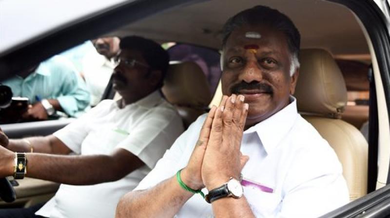 AIADMK Puratchi Thalaivi Amma Faction leader and former Chief Minister O Panneerselvam arriving at his official residence at Greenways Road as part of merger talks with party supporters in Chennai on Friday. (Photo: PTI) AIADMK Puratchi Thalaivi Amma Faction leader and former Chief Minister O Panneerselvam arriving at his official residence at Greenways Road as part of merger talks with party supporters in Chennai on Friday. (Photo: PTI)