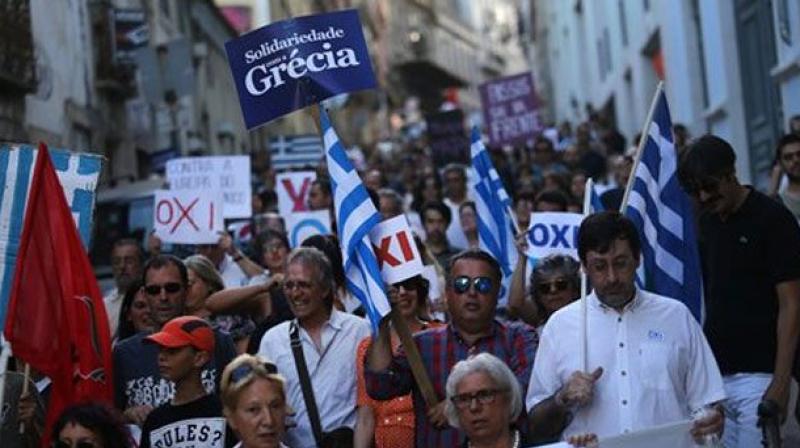 Greece exits the last of its three bailouts on August 20 and hopes to be able to borrow again in international markets after a nearly nine-year debt crisis that shrank the economy by a quarter and forced it to implement painful austerity measures. (Photo: AP) Greece exits the last of its three bailouts on August 20 and hopes to be able to borrow again in international markets after a nearly nine-year debt crisis that shrank the economy by a quarter and forced it to implement painful austerity measures. (Photo: AP)