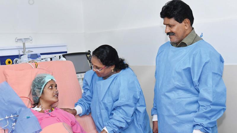Jenisha with parents at hospital. (Inset) M. Nithin who donated the organs. Jenisha with parents at hospital. (Inset) M. Nithin who donated the organs.