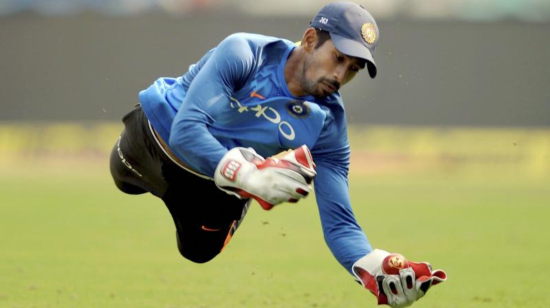 Wriddhiman, who is only three months shy of his 35th birthday, is returning after a career-threatening injury that many believe has been completely mismanaged at the National Cricket Academy. (Photo: PTI) Wriddhiman, who is only three months shy of his 35th birthday, is returning after a career-threatening injury that many believe has been completely mismanaged at the National Cricket Academy. (Photo: PTI)