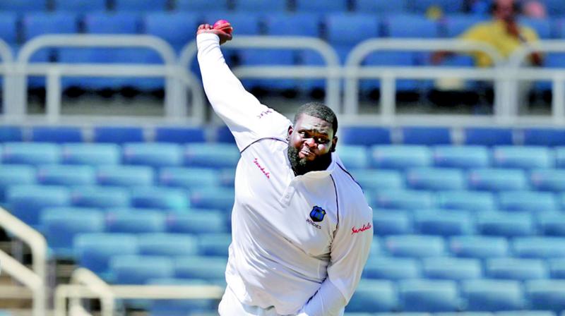 Rahkeem Cornwall bowls on the opening day of the second Test at Kingston. (Photo: AP) Rahkeem Cornwall bowls on the opening day of the second Test at Kingston. (Photo: AP)
