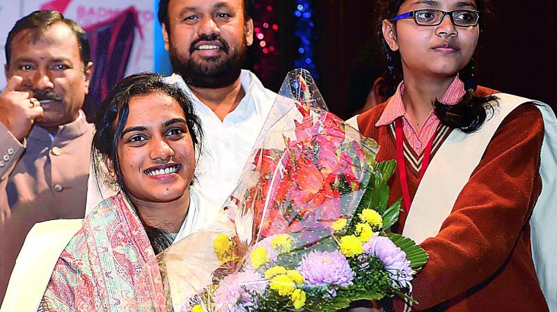 P.V. Sindhu at a felicitation event in New Delhi on Tuesday (Photo:AP) P.V. Sindhu at a felicitation event in New Delhi on Tuesday (Photo:AP)