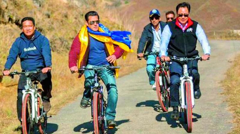 CM Pema Khandu, Salman Khan, and minister Kiren Rijiju on a cycling trip in Arunachal Pradesh. CM Pema Khandu, Salman Khan, and minister Kiren Rijiju on a cycling trip in Arunachal Pradesh.