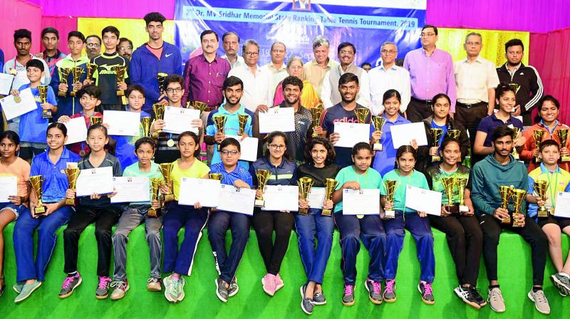 Medallists pose at the conclusion of Dr M. V. Sridhar memorial Table Tennis tournament in Hyderabad. Medallists pose at the conclusion of Dr M. V. Sridhar memorial Table Tennis tournament in Hyderabad.