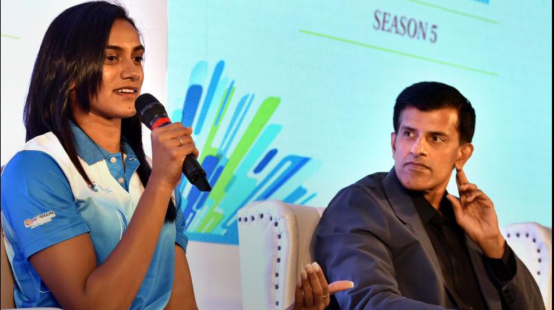 Vimal Kumar with PV Sindhu, a medal prospect. PTI Photo