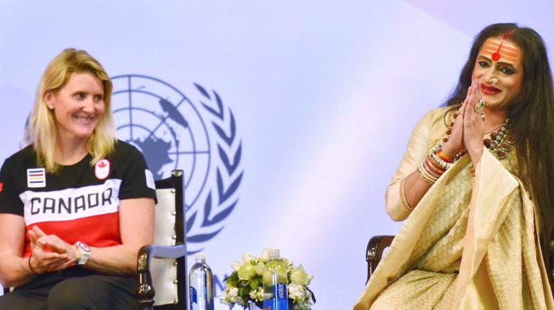 Four-time Canadian Olympic gold medalist Hayley Wickenheiser (left) at the United Nations Young Changemakers Conclave, in New Delhi, on Saturday. Also seen is Laxmi Narayan Tripathi, transgender rights activist. PTI Photo