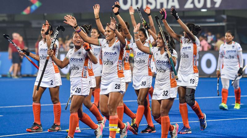 Indian Womens hockey team celebrates after qualifying for Tokyo Olympics at the end of FIH Olympic Qualifiers 2019 with a win against USA at Kalinga Stadium in Bhubaneswar, Odisha, on Nov. 2, 2019. PTI Photo