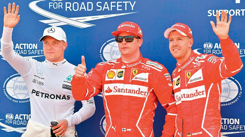 Kimi Raikkonen (centre), Sebastian Vettel (right) and Valtteri Bottas celebrate after winning the qualifying session in 2017 Monaco GP in Monaco. DC File Photo Kimi Raikkonen (centre), Sebastian Vettel (right) and Valtteri Bottas celebrate after winning the qualifying session in 2017 Monaco GP in Monaco. DC File Photo
