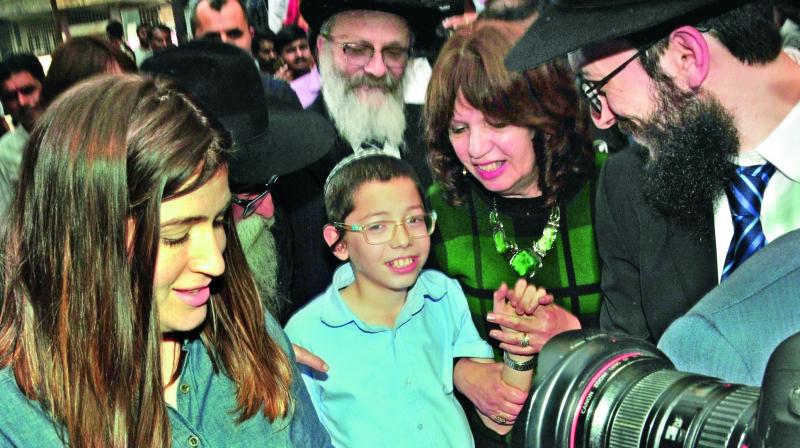 Israeli boy Moshe Holtzberg arrives at Nariman House in Colaba, Mumbai on Tuesday. (Photo: Debasish Dey) Israeli boy Moshe Holtzberg arrives at Nariman House in Colaba, Mumbai on Tuesday. (Photo: Debasish Dey)
