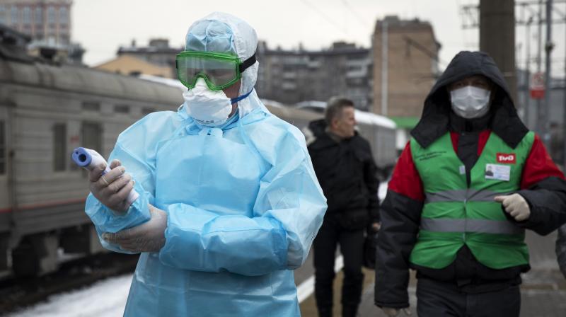 In the photo taken of Jan 31, medical workers prepare to check passengers arriving from Beijing at the Yaroslavsky railway station in Moscow in Russia. AP Photo