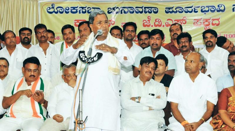 JD(S)-Congress coalition coordination committee chairman Siddaramaiah speaks during a JDS-Congress preliminary meeting on Lok Sabha election in Mysuru on Friday (Photo: KPN) JD(S)-Congress coalition coordination committee chairman Siddaramaiah speaks during a JDS-Congress preliminary meeting on Lok Sabha election in Mysuru on Friday (Photo: KPN)