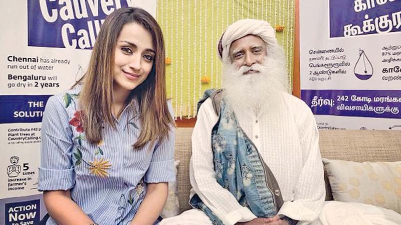 Trisha with Jaggi Vasudev Trisha with Jaggi Vasudev