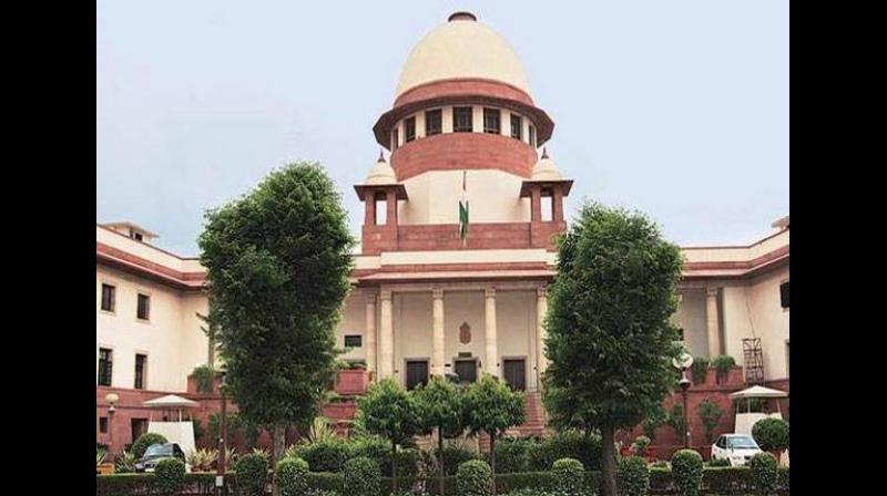 'The dome structure in the inner courtyard belongs to the Nirmohi Akhara. They have been wrongfully deprived of the charge and management of the temple,' Jain appearing on behalf of the Akhara told the court. (Photo: File) 'The dome structure in the inner courtyard belongs to the Nirmohi Akhara. They have been wrongfully deprived of the charge and management of the temple,' Jain appearing on behalf of the Akhara told the court. (Photo: File)