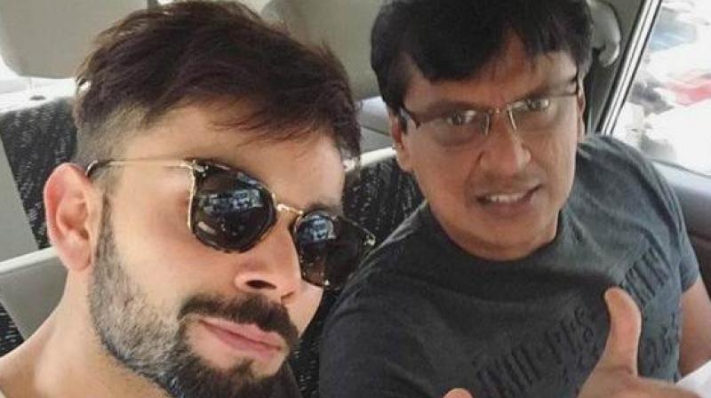 Virat Kohli and Shankar Basu. (Photo: Twitter) Virat Kohli and Shankar Basu. (Photo: Twitter)