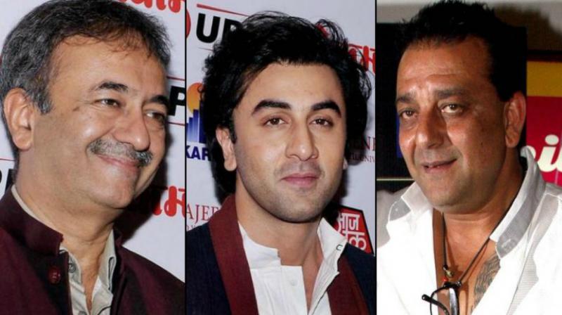 Rajkumar Hirani, Ranbir Kapoor, Sanjay Dutt at an event. Rajkumar Hirani, Ranbir Kapoor, Sanjay Dutt at an event.