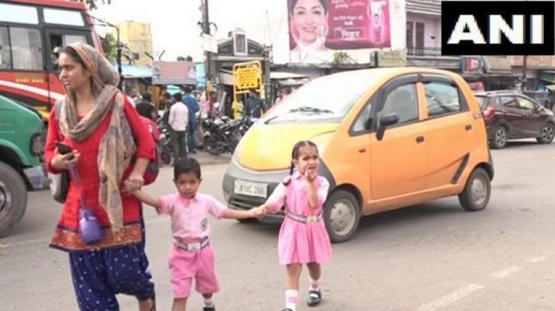 Echoing her opinion, several students have expressed their happiness over the district administration's decision to reopen the schools in the state. (Photo: ANI) Echoing her opinion, several students have expressed their happiness over the district administration's decision to reopen the schools in the state. (Photo: ANI)