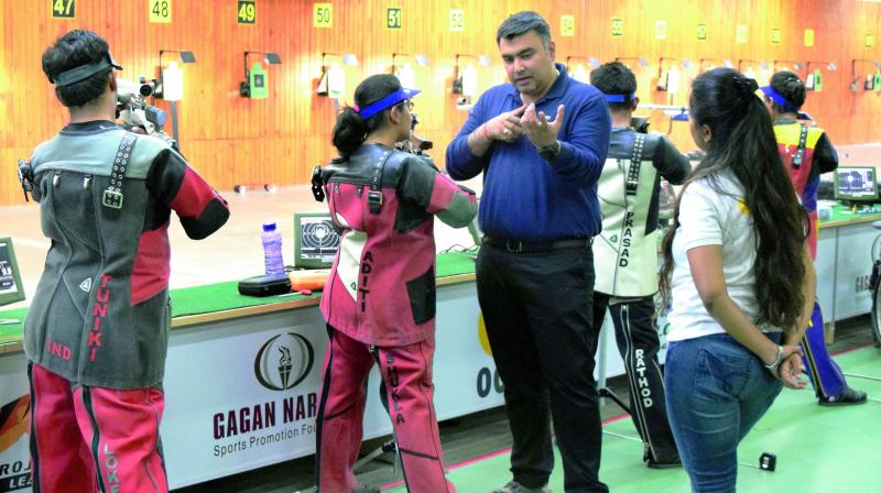 Four-time Olympian Gagan Narang imparts tips to trainees at the Gagan Narang Sports Promotion Foundation shooting academy in this file photo. Four-time Olympian Gagan Narang imparts tips to trainees at the Gagan Narang Sports Promotion Foundation shooting academy in this file photo.