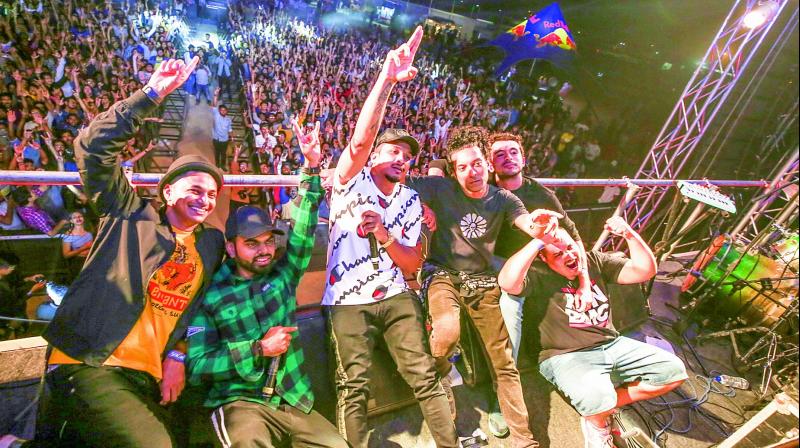 Rapper Divine with DJ KAN-i capture the crowds with a selfie. Rapper Divine with DJ KAN-i capture the crowds with a selfie.