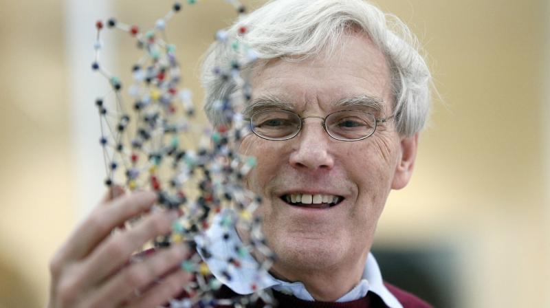Richard Henderson, one of the 2017 Nobel Prize winners in Chemistry, holds a bacterio rhodopsin model prior to a press conference at the Laboratory of Molecular Biology in Cambridge, England, Wednesday, Oct. 4, 2017. Three researchers based in the US, UK and Switzerland won the Nobel Prize in Chemistry on Wednesday for developments in electron microscopy. The 9-million-kronor ($1.1 million) prize is shared by Jacques Dubochet of the University of Lausanne, Joachim Frank at New York’s Columbia University and Richard Henderson of MRC Laboratory of Molecular Biology in Cambridge, Britain. (Frank Augstein/Associated Press) Richard Henderson, one of the 2017 Nobel Prize winners in Chemistry, holds a bacterio rhodopsin model prior to a press conference at the Laboratory of Molecular Biology in Cambridge, England, Wednesday, Oct. 4, 2017. Three researchers based in the US, UK and Switzerland won the Nobel Prize in Chemistry on Wednesday for developments in electron microscopy. The 9-million-kronor ($1.1 million) prize is shared by Jacques Dubochet of the University of Lausanne, Joachim Frank at New York’s Columbia University and Richard Henderson of MRC Laboratory of Molecular Biology in Cambridge, Britain. (Frank Augstein/Associated Press)