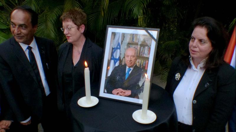 (From right) Consul General of Israel in Bengaluru Yael Hashavit, Consul General of the Federal Republic of Germany in Bengaluru Margit Hellwig Botte and Ambasssador N. Parthasarathi during the memorial service for former Prime Minister of Israel and Nobel Peace Prize winner Shimon Peres in Bengaluru on Monday (Photo: R. Samuel) (From right) Consul General of Israel in Bengaluru Yael Hashavit, Consul General of the Federal Republic of Germany in Bengaluru Margit Hellwig Botte and Ambasssador N. Parthasarathi during the memorial service for former Prime Minister of Israel and Nobel Peace Prize winner Shimon Peres in Bengaluru on Monday (Photo: R. Samuel)