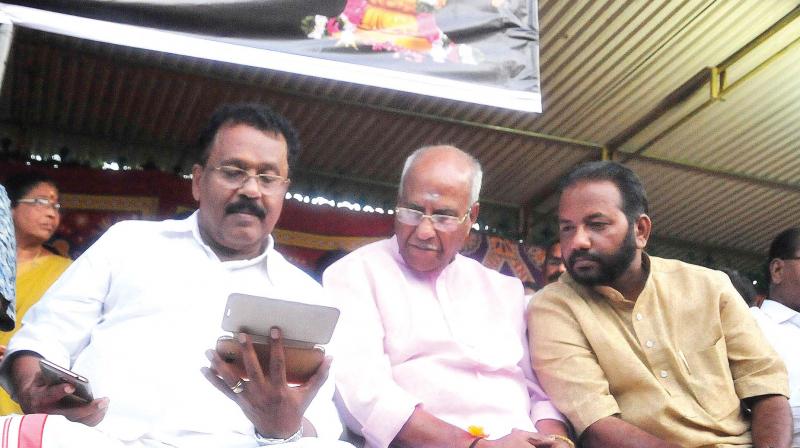 BJP state president P.S. Sreedharan Pillai, O. Rajagopal, MLA, and district president S. Suresh watch live footage of Pinarayi Vijayan's speech at Kannur, during the Akhanda Nama Japa in front of Secretariat in Thiruvananthapuram on Monday. BJP state president P.S. Sreedharan Pillai, O. Rajagopal, MLA, and district president S. Suresh watch live footage of Pinarayi Vijayan's speech at Kannur, during the Akhanda Nama Japa in front of Secretariat in Thiruvananthapuram on Monday.