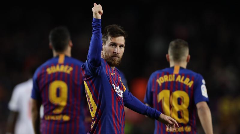Messi drove the ball into the bottom corner after being teed up by Luis Suarez, who added two goals to his own tally either side of the Argentinian marking another historic record at the Camp Nou. (Photo: AP) Messi drove the ball into the bottom corner after being teed up by Luis Suarez, who added two goals to his own tally either side of the Argentinian marking another historic record at the Camp Nou. (Photo: AP)