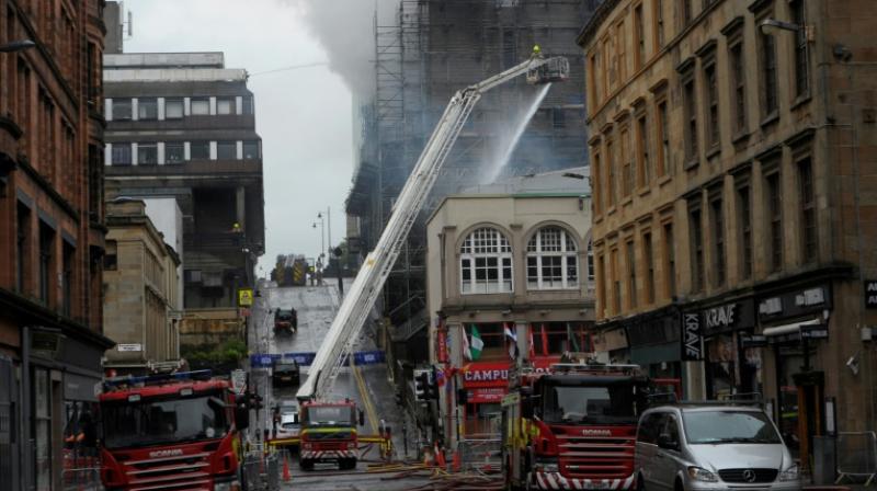 The inferno has been largely contained after 120 firefighters tackled the blaze. (photo: AFP) The inferno has been largely contained after 120 firefighters tackled the blaze. (photo: AFP)