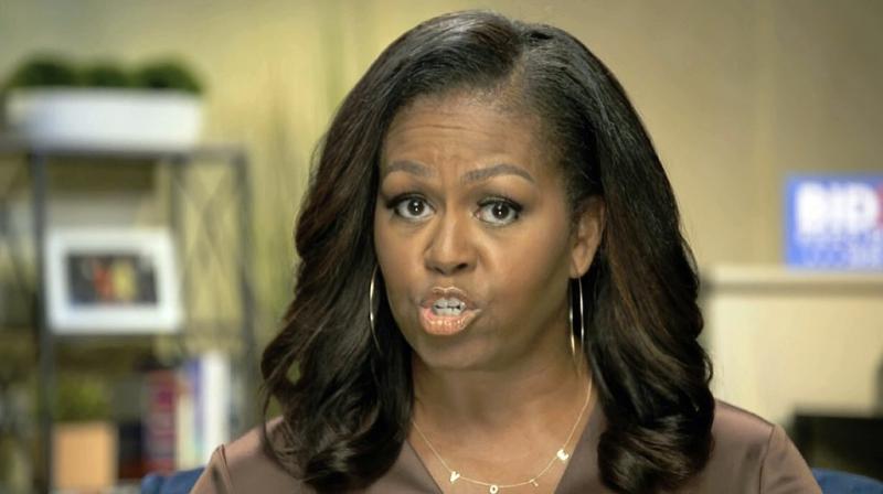 In this image from video, former first lady Michelle Obama speaks during the first night of the Democratic National Convention.  AP photo