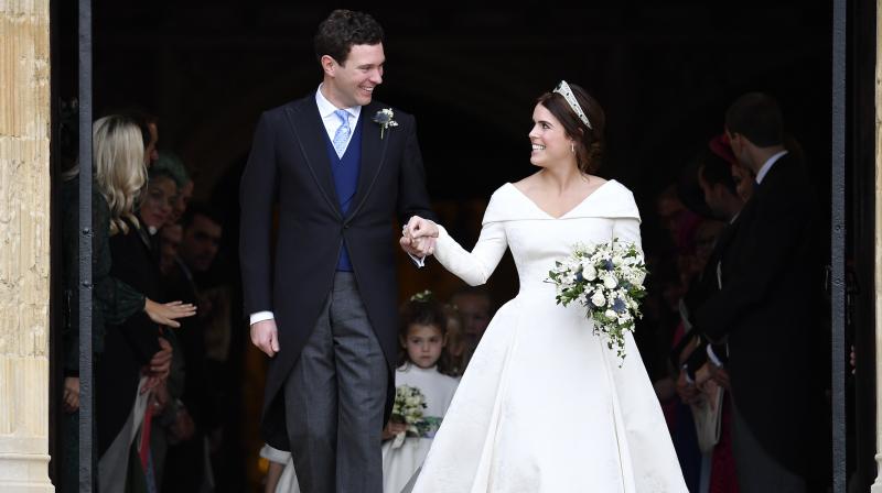 Princess Eugenie, the ninth in line to the British throne, was watched over by the Queen and Prince Philip along with other members of her family as she married her long-term partner. (Photo: AP) Princess Eugenie, the ninth in line to the British throne, was watched over by the Queen and Prince Philip along with other members of her family as she married her long-term partner. (Photo: AP)