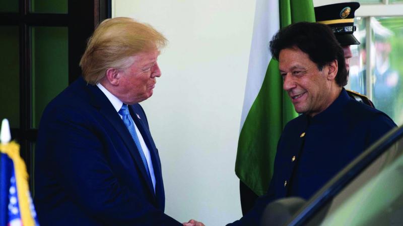 US President Donald Trump greets Pakistan Prime Minister Imran Khan at the White House in Washington DC on Monday. (Photo: AFP) US President Donald Trump greets Pakistan Prime Minister Imran Khan at the White House in Washington DC on Monday. (Photo: AFP)
