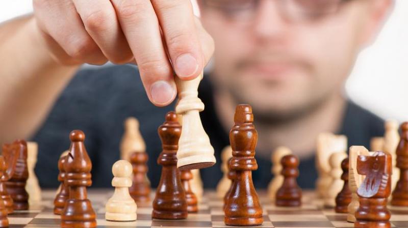 Telangana’s M. Chakravarthy Reddy wins the prize money of Rs 1,00,000 after beating Al Muthaiah of Tamil Nadu in a tie-breaker match of the 1st NITHM All India Open Fide Rating Chess tournament. Telangana’s M. Chakravarthy Reddy wins the prize money of Rs 1,00,000 after beating Al Muthaiah of Tamil Nadu in a tie-breaker match of the 1st NITHM All India Open Fide Rating Chess tournament.