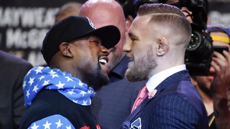 McGregor and Mayweather traded clever insults and profane boasts among each other. (Photo: AP) McGregor and Mayweather traded clever insults and profane boasts among each other. (Photo: AP)